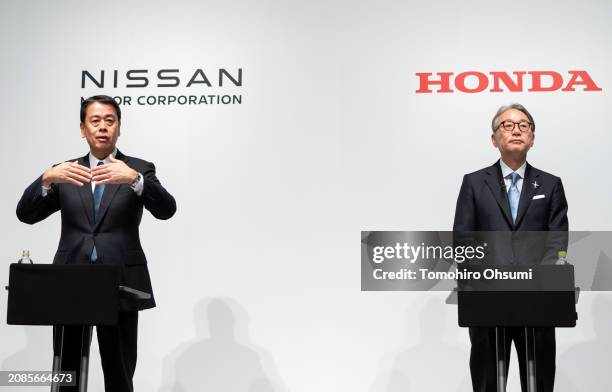 Nissan Motor CEO Makoto Uchida speaks as Honda Motor CEO Toshihiro Mibe listens during a joint press conference on March 15, 2024 in Tokyo, Japan....