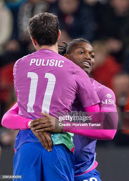 Christian Pulisic of AC Milan celebrates goal with Rafael Leao of AC Milan during the UEFA Europa League 2023/24 round of 16 second leg match between...