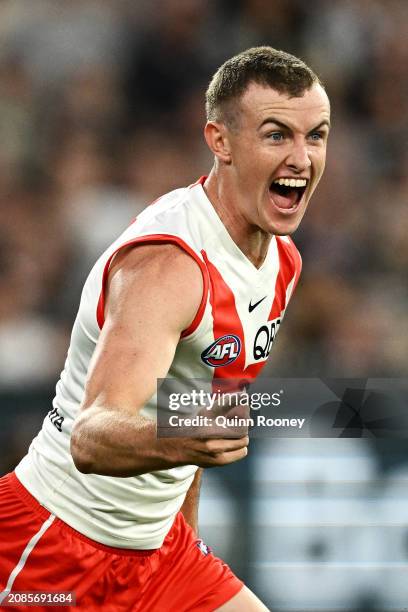 Chad Warner of the Swans celebrates kicking a goal during the round one AFL match between Collingwood Magpies and Sydney Swans at Melbourne Cricket...