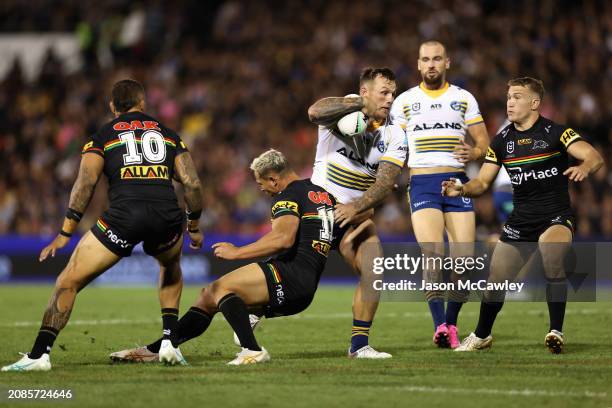 Maine Hopgood of the Eels is tackled during the round two NRL match between Penrith Panthers and Parramatta Eels at BlueBet Stadium, on March 15 in...