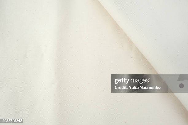 linen textile close-up in full frame, linen fabric. - white shirt texture stock pictures, royalty-free photos & images