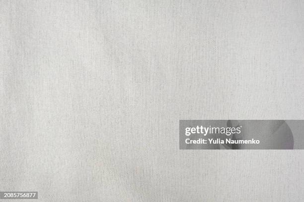 linen textile close-up in full frame, linen fabric. - white shirt texture stock pictures, royalty-free photos & images