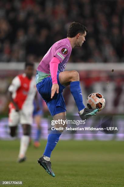 Christian Pulisic of AC Milan plays the ballduring the UEFA Europa League 2023/24 round of 16 second leg match between Slavia Praha and AC Milan at...