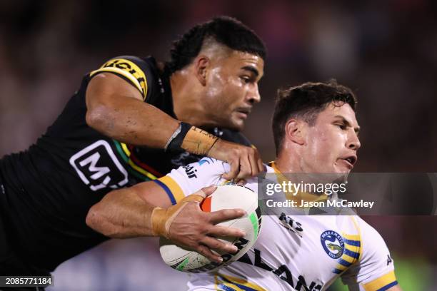 Mitchell Moses of the Eels is tackled during the round two NRL match between Penrith Panthers and Parramatta Eels at BlueBet Stadium, on March 15 in...