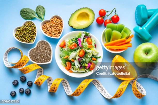 healthy food and exercising background. - slank stockfoto's en -beelden
