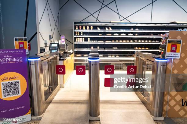 self checkout of an automated cashierless store in doha. - intelligence stock pictures, royalty-free photos & images