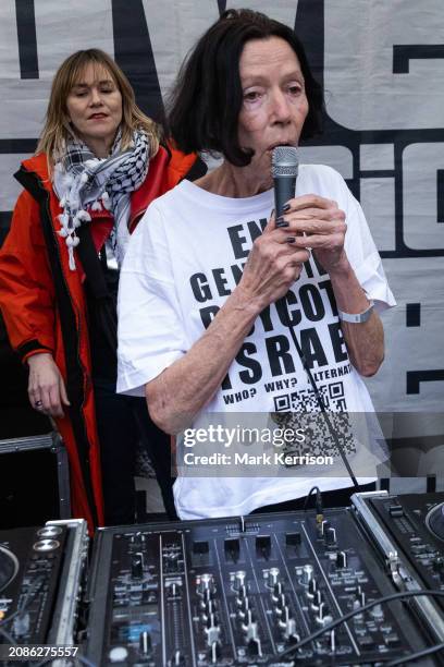 Fashion designer Katharine Hamnett, wearing a t-shirt reading 'End Genocide Boycott Israel', addresses anti-racism activists taking part in a House...