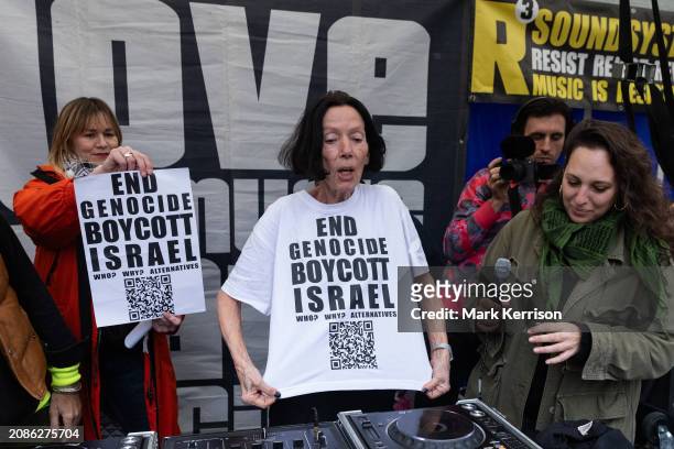 Fashion designer Katharine Hamnett, wearing a t-shirt reading 'End Genocide Boycott Israel', addresses anti-racism activists taking part in a House...
