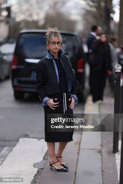 Guest seen wearing Miu Miu brown glasses, a black polo shirt, a blue chequered shirt, Miu Miu black short jacket, the matching Miu Miu black midi...