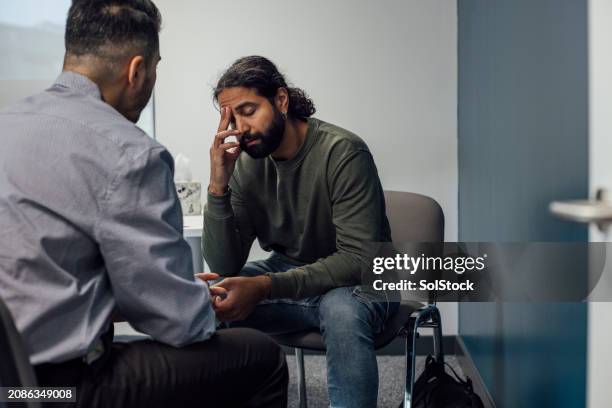 feeling sad at hospital - anxiety stock pictures, royalty-free photos & images