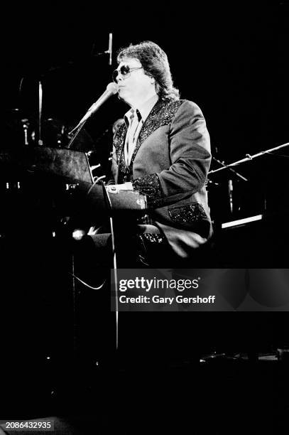 American country musician Ronnie Milsap plays electric piano as he performs onstage at the New York State Pavilion, Flushing Meadows, Queens, New...