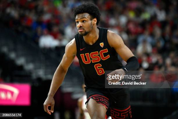 Bronny James of the USC Trojans looks on in the second half of a quarterfinal game against the Arizona Wildcats during the Pac-12 Conference...