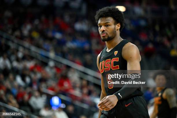 Bronny James of the USC Trojans looks on in the second half of a quarterfinal game against the Arizona Wildcats during the Pac-12 Conference...