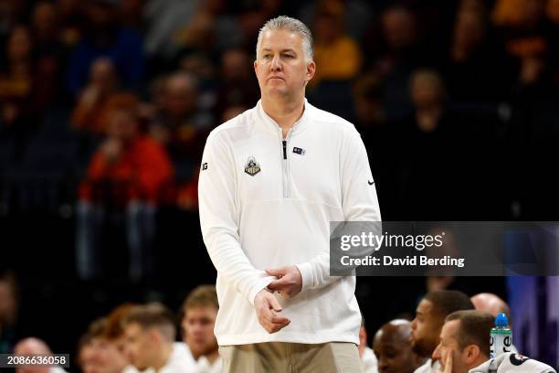 Head coach Matt Painter of the Purdue Boilermakers looks on against the Michigan State Spartans in the first half at Target Center in the...