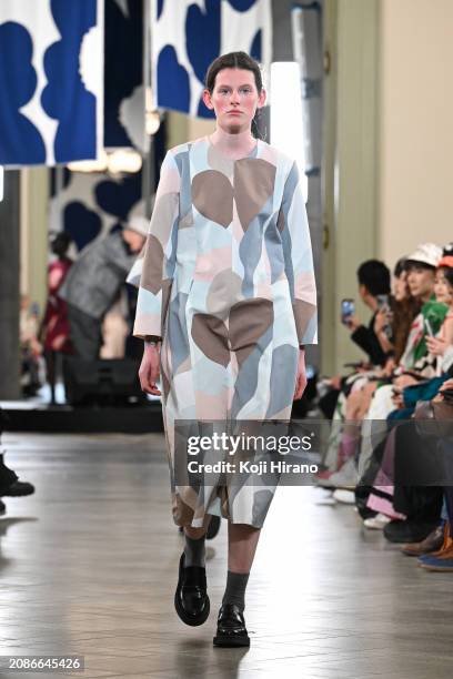 Model walks the runway in a design by Marimekko during the Rakuten Fashion Week TOKYO 2024 A/W on March 15, 2024 in Tokyo, Japan.