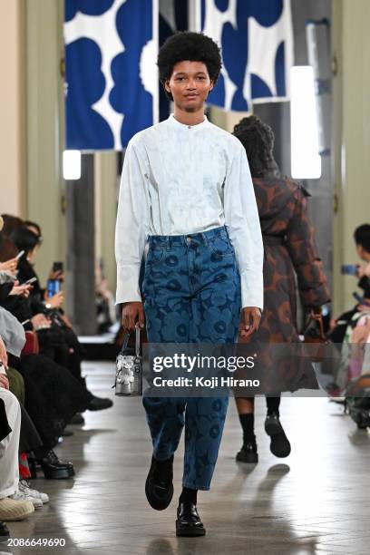 Model walks the runway in a design by Marimekko during the Rakuten Fashion Week TOKYO 2024 A/W on March 15, 2024 in Tokyo, Japan.