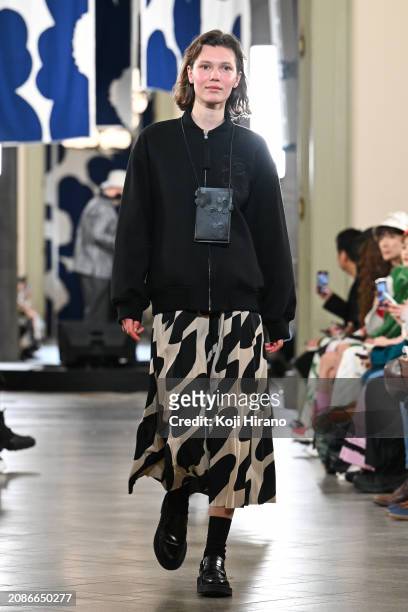 Model walks the runway in a design by Marimekko during the Rakuten Fashion Week TOKYO 2024 A/W on March 15, 2024 in Tokyo, Japan.