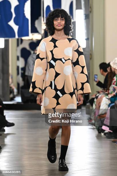 Model walks the runway in a design by Marimekko during the Rakuten Fashion Week TOKYO 2024 A/W on March 15, 2024 in Tokyo, Japan.