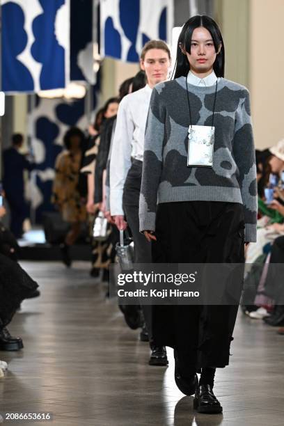 Models walk the runway in a design by Marimekko during the Rakuten Fashion Week TOKYO 2024 A/W on March 15, 2024 in Tokyo, Japan.