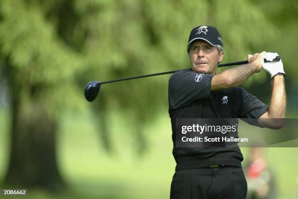 Gary Player hits a shot during the first round of the Senior PGA Championship at the Aronimink Golf Club on June 5, 2003 in Newtown Square,...
