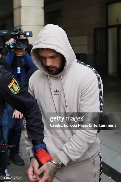 Arseny G. Leaving the courthouse to testify about the robbery of Maria del Monte. On March 15 in Seville . The Court of Instruction number 16 of...