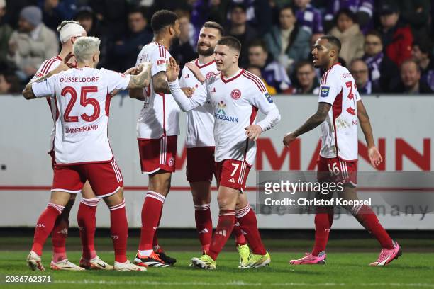 Christos Tzolis of Düsseldorf celebrates the first goal with his team mates during the Second Bundesliga match between VfL Osnabrück and Fortuna...