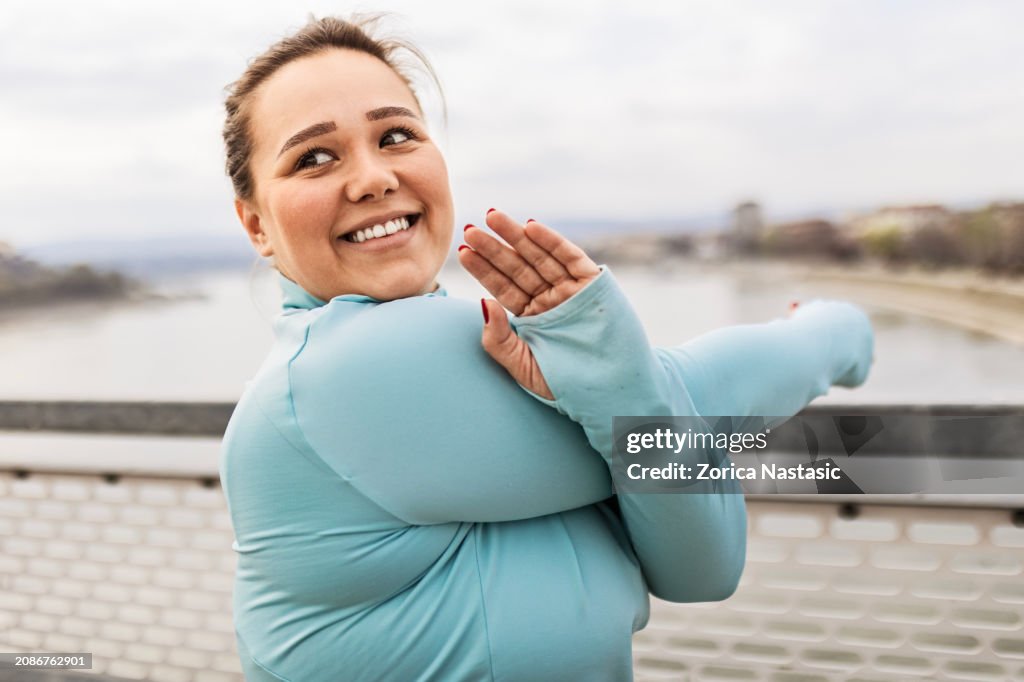 Overweight Woman Stretching