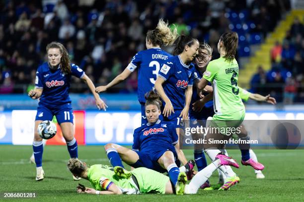 Franziska Harsch , Marta Cazalla Garcia , Fabienne Dongus and Sarai Linder of Hoffenheim fight for the ball with Alexandra Popp and Lena Oberdorf of...