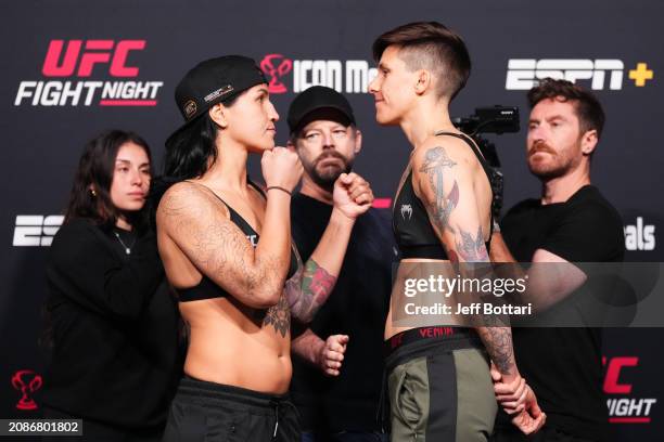 Pannie Kianzad of Iran and Macy Chiasson face off during the UFC Fight Night weigh-in at UFC APEX on March 15, 2024 in Las Vegas, Nevada.