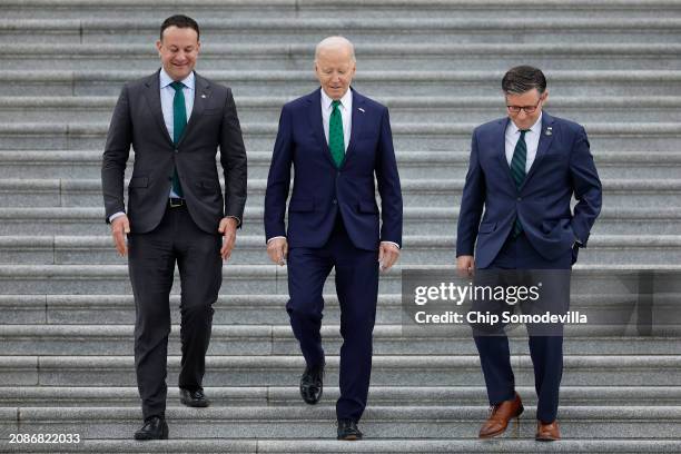 Irish Taoiseach Leo Varadkar, U.S. President Joe Biden and Speaker of the House Mike Johnson walk out of the U.S. Capitol on March 15, 2023 in...