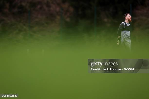 Jose Sa of Wolverhampton Wanderers reacts during a Wolverhampton Wanderers Training Session at The Sir Jack Hayward Training Ground on March 13, 2024...