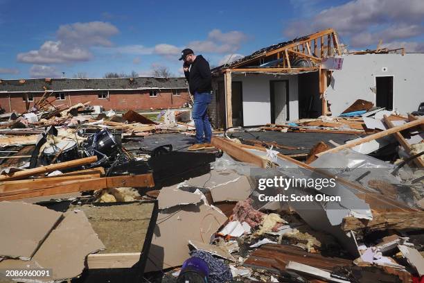 Pastor Matthew Holloway surveys damage to his church after the structure was leveled by a tornado on March 15, 2024 in Winchester, Indiana. At least...