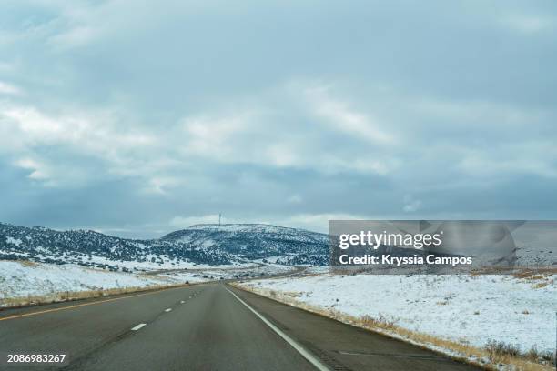 winter road landscape in utah - usa - grand county utah stock pictures, royalty-free photos & images