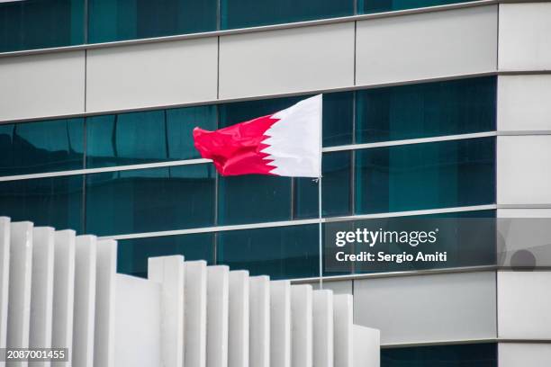 qatari flag - qatari flag stock pictures, royalty-free photos & images