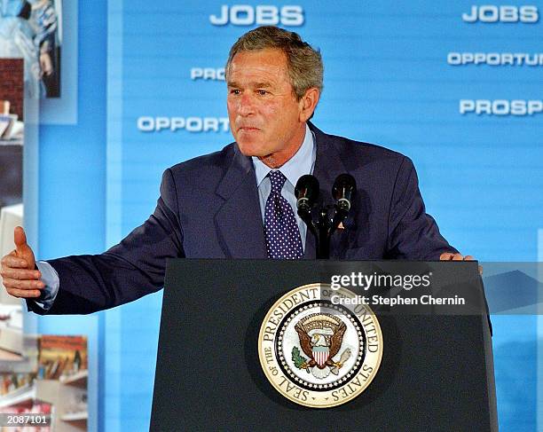 President George W. Bush speaks to area business people June 16, 2003 in Elizabeth, New Jersey. Bush touted his initiative to create more jobs to...
