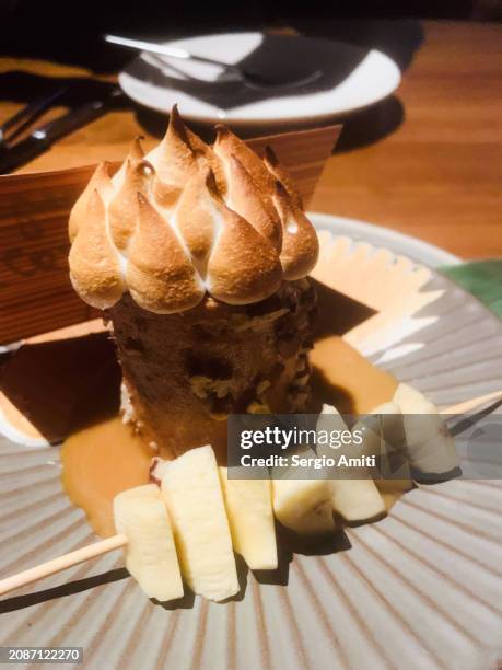 pecan tree cake baked alaska, miso butterscotch - baked alaska stock pictures, royalty-free photos & images