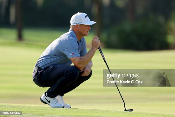 Alex Noren of Sweden lines up a putt on the seventh green during the second round of THE PLAYERS Championship on the Stadium Course at TPC Sawgrass...