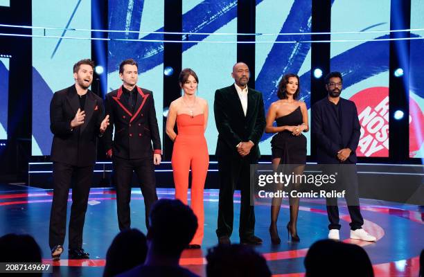 Pictured here is Joel Dommett, David Tennant, Davina McCall, Lenny Henry, Maya Jama and Romesh Ranganathan during the Red Nose Day night of TV for...