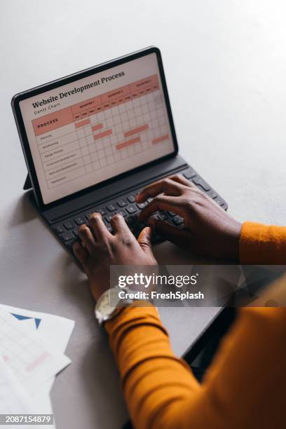 professional working on tablet, a close up - gantt chart stock pictures, royalty-free photos & images