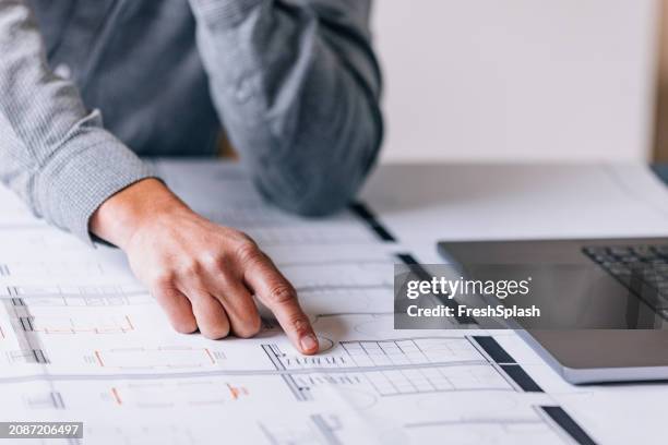 professional planning project stages with gantt chart on desk - gantt chart stock pictures, royalty-free photos & images