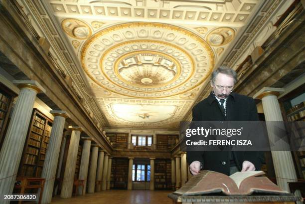 Director of the Calvinistic College Library in Sarospatak, Denes Dienes reads the Bible of Vizsolyon 08 February 2006 in Sarospatak Library 230km...