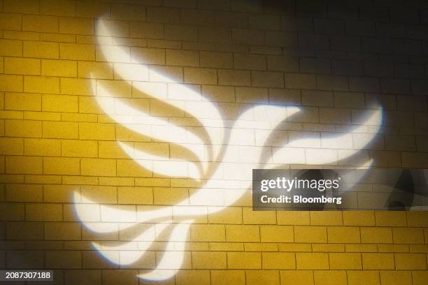 Liberal Democrats logo projected in the conference hall during the Liberal Democrats Spring Conference 2024 in York, UK, on Sunday, March 17, 2024....