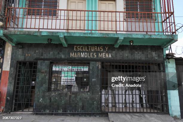 Facade of the sculpture company of the Mena family during the work in the family company Esculturas Mena, which for decades has been dedicated to the...