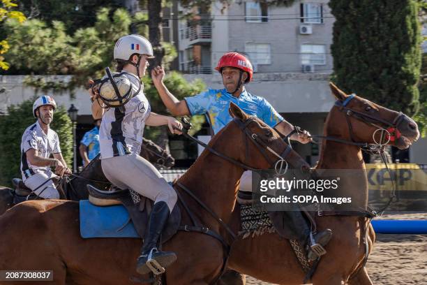 Mexican player Esteban Flores of team Sierra de los Padres and French player Charlotte Laguerre, of team Simone seen in action during the Open...