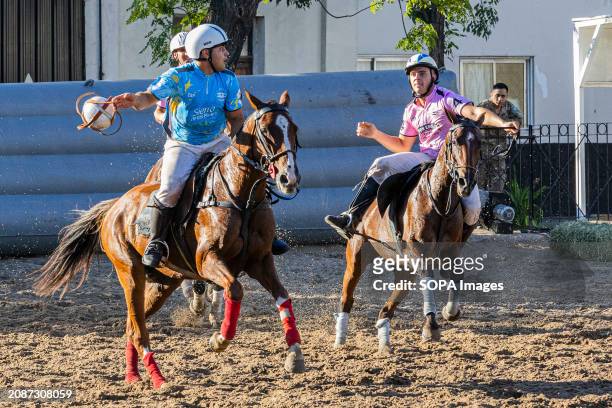 Argentina's Narciso Diaz of team Sierra de los Padres and Gonzalo Etulain of team Don Emilio , seen in action during the Open Horseball Argentina,...