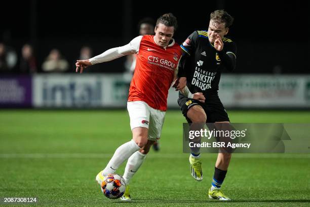 Goncalo Esteves of Jong AZ, Agustin Anello of SC Cambuur challenge for the ball during the Dutch Keuken Kampioen Divisie match between Jong AZ and SC...