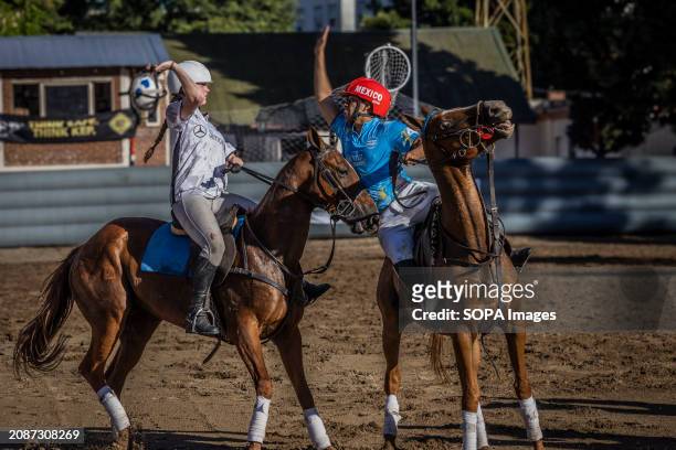 French player Charlotte Laguerre of Team Simone and Sierra de los Padres' Mexican player Esteban Flores seen in action during the Open Horseball...