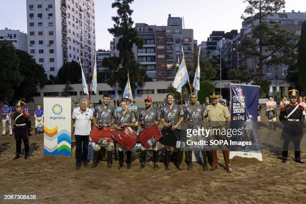The A&R team, runners-up of the Open Horseball Argentina, pose with the awards received with the Englishman Jim Copeland vice-president of the...