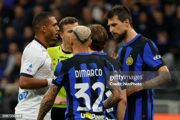 Juan Jesus of Napoli is talking with Francesco Acerbi of Inter during the Serie A soccer match between Inter FC and SSC Napoli at Stadio Meazza in...