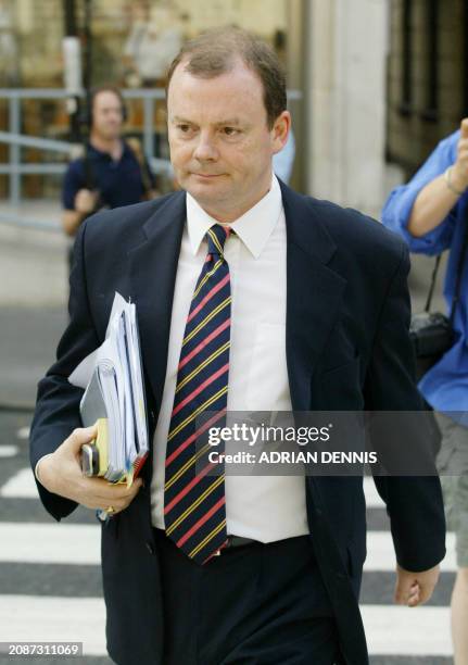 Director of News, Richard Sambrook arrives at the Royal Courts of Justice in London, 13 August, 2003 where he will be questioned about the BBC's...